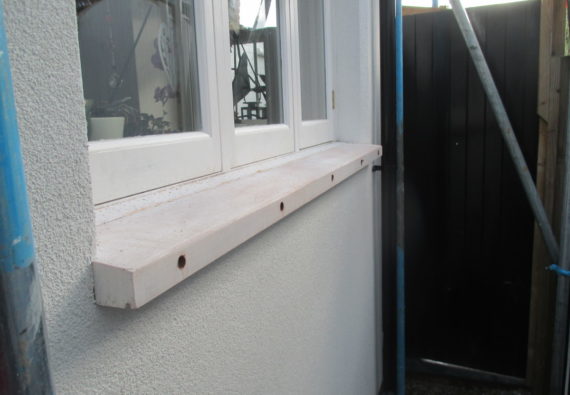 How do you deal with window sills on an External Insulation job?