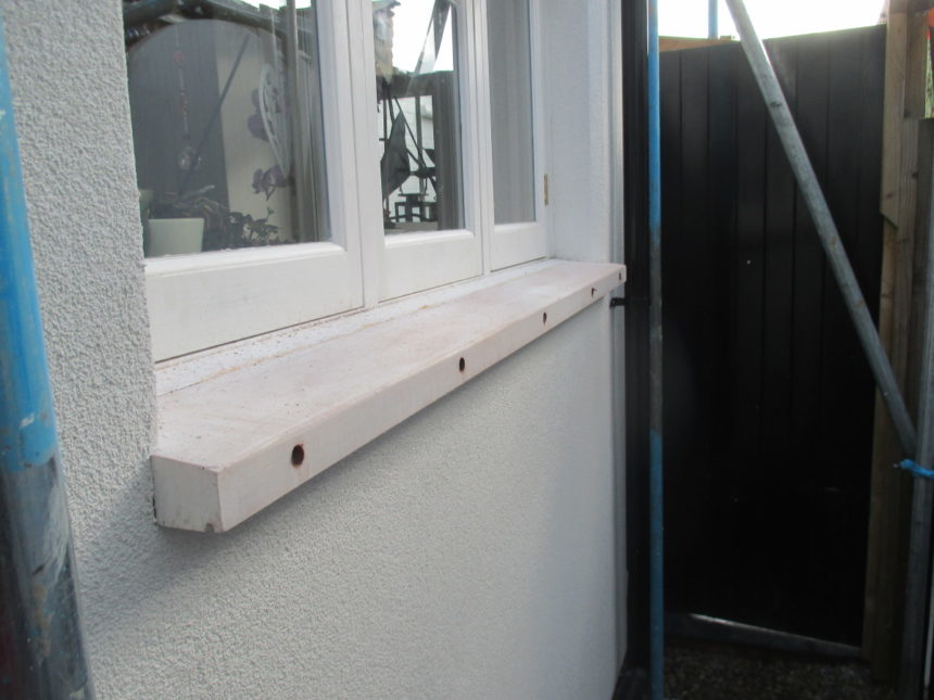 How do you deal with window sills on an External Insulation job?